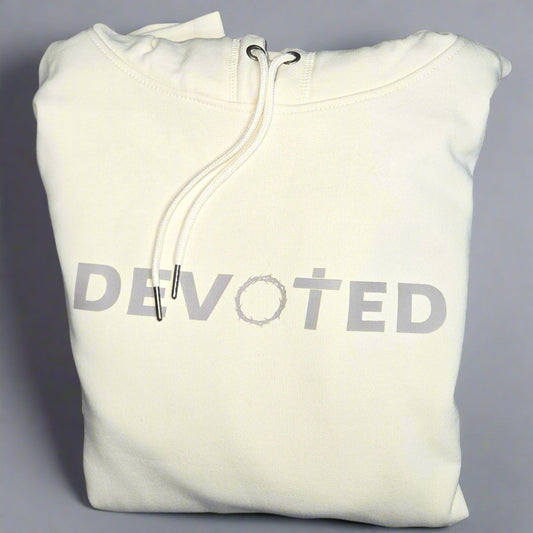 White hoodie with 'DEVOTED' text on a gray background